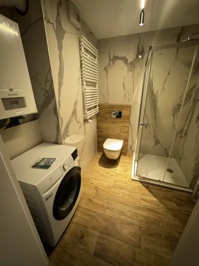 Przytulny apartament w centrum Kielc z miejscem parkingowym na Okrzei - miniatura 4
