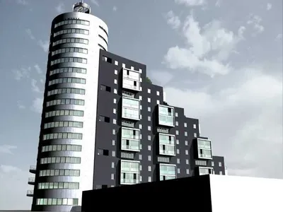 Nowoczesny budynek apartamentowy z wysoką cylindryczną wieżą, ciemną elewacją, dużymi przeszkleniami i balkonami, widoczny na tle nieba w miejskiej zabudowie.